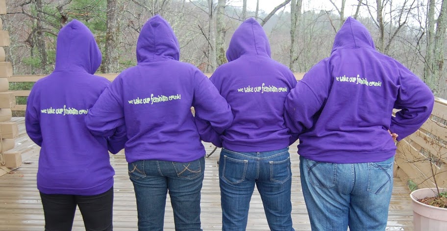 Four CFs showing off the CFC Sweatshirt logo