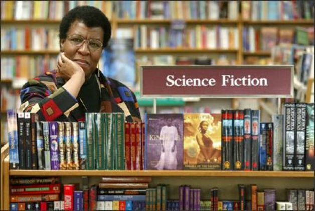 Octavia Butler being a beautiful badass surrounded by her books.