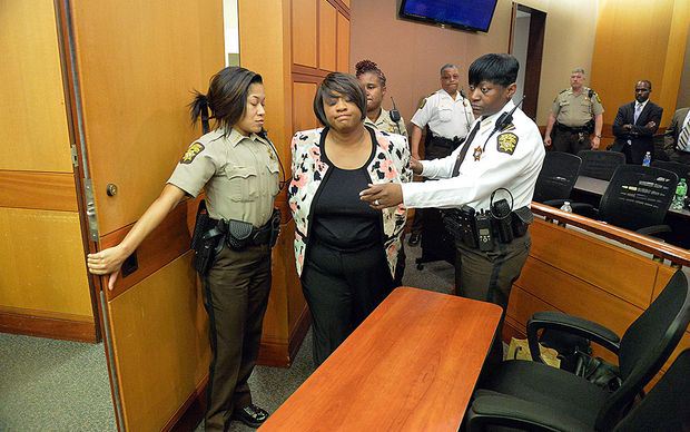 APS teacher being arrested in the wake of the cheating scandal